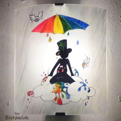 applique murale au dessin d'un personnage sous une pluie multicolore