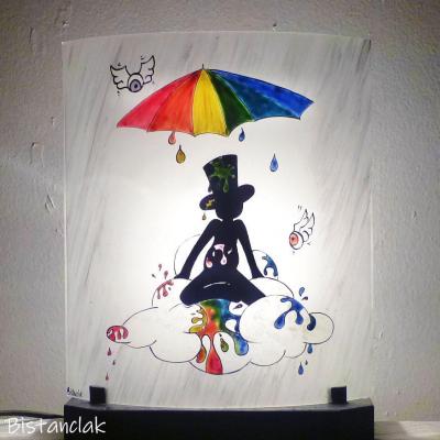 luminaire décoratif au dessin de zébulon sous une pluie multicolore