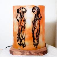 Lampe d'ambiance en verre orange motif les femmes nomades
